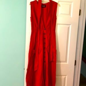 Beautiful red linen Reformation dress. Deep V with flared skirt, tea length.